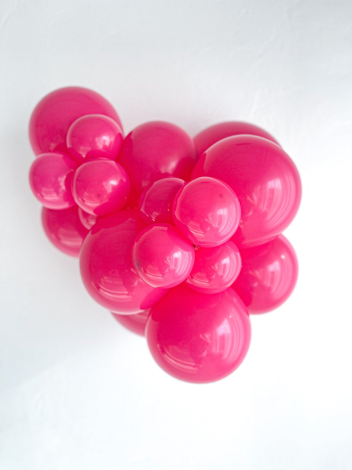 TUFTEX Hot Pink balloons – inflated color cluster